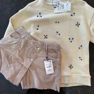 Zara skort and beaded sweatshirt outfit